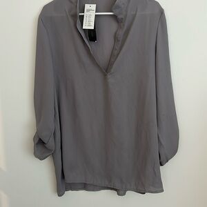 Zanzea blouse nice and sheer but not see thru. Size Large. longer in back then f